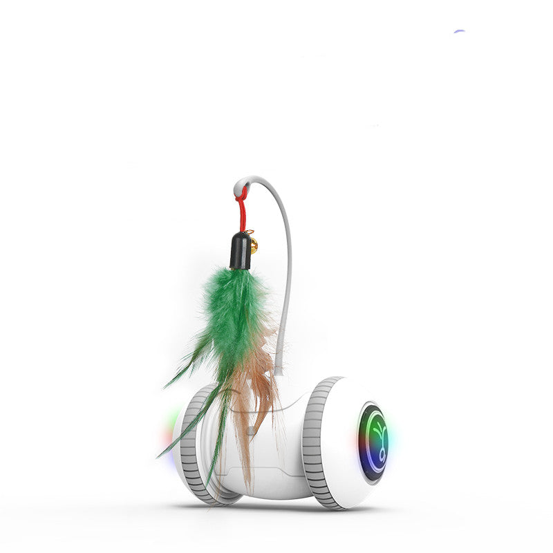 Interactive cat toy robot with green feather and tan feather tassel