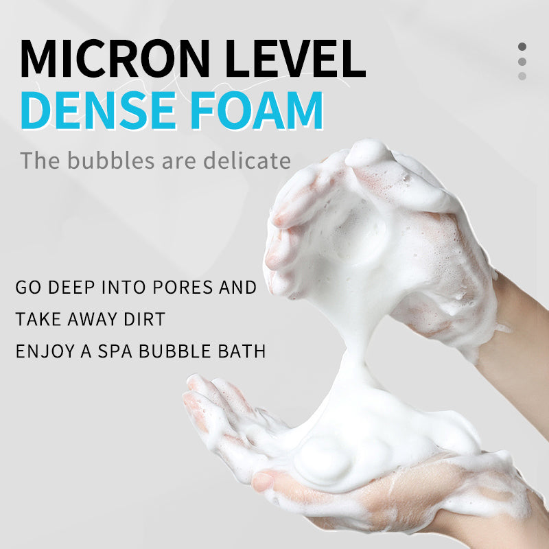 Amino acid face cleanser dense foam in hands, lather bubbles visible