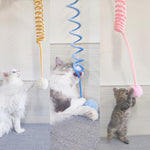 Cat spring toy wand with blue coil and plush pom ball