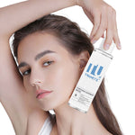 Tunmate toner bottle held near a woman’s cheek and forehead, white cap visible