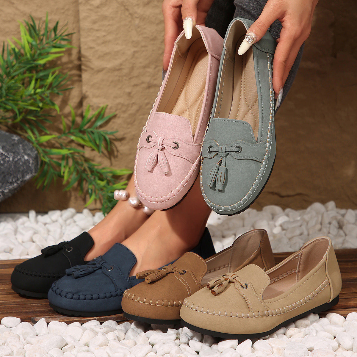 Women’s loafers pair in pink and sage green, round toe, tassel lace, flat sole
