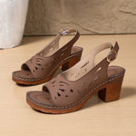 Brown peep-toe platform sandals with geometric cutouts and round buckle mid heel