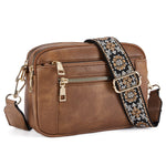 Crossbody bag in brown with triple zippers and floral patterned embroidered strap