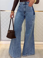 Light blue high-waisted flared jeans with belt loops and front pockets