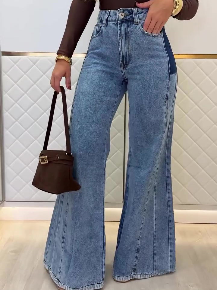 Light blue high-waisted flared jeans with belt loops and front pockets