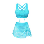 Turquoise crochet bikini with crisscross back bra top and gathered ruffle skirt
