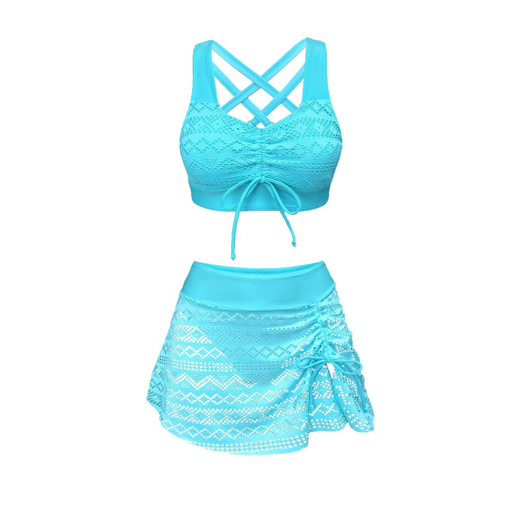 Turquoise crochet bikini with crisscross back bra top and gathered ruffle skirt