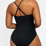 Women's ruched one-piece swimsuit back with crisscross straps, black solid color