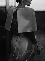 Satin cape-style top and fitted maxi dress, back view, dark satin fabric, ribbon tie