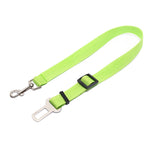 Adjustable dog car seat belt strap in light green with metal clips and buckle adjuster.