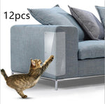 Translucent PVC sofa guard pad on blue couch armrest with cat paw at edge
