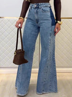 Light blue high-waisted flared jeans with dark patch pocket accents