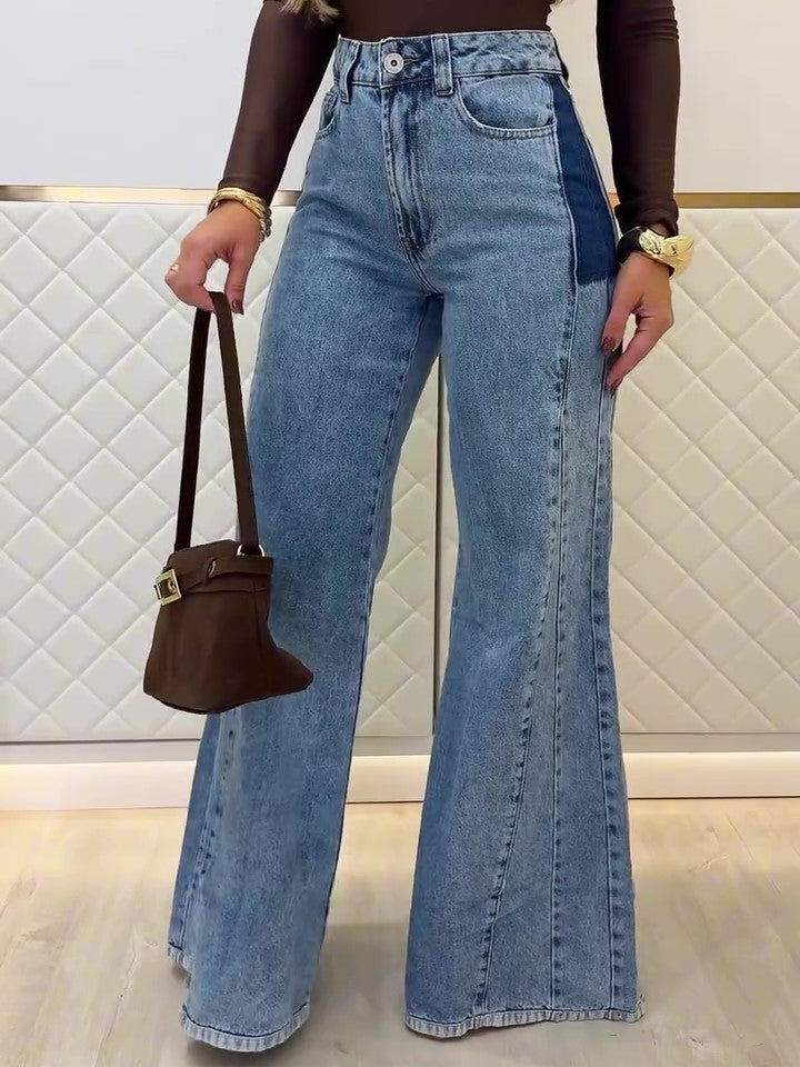 Light blue high-waisted flared jeans with dark patch pocket accents