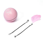 Pink LED rolling cat toy ball with black tether straps and pink feather