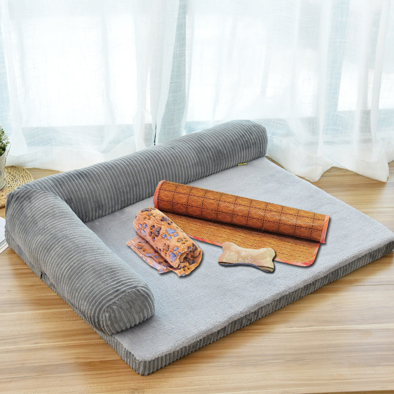Gray pet dog bed with ribbed side bolsters and light gray plush mat