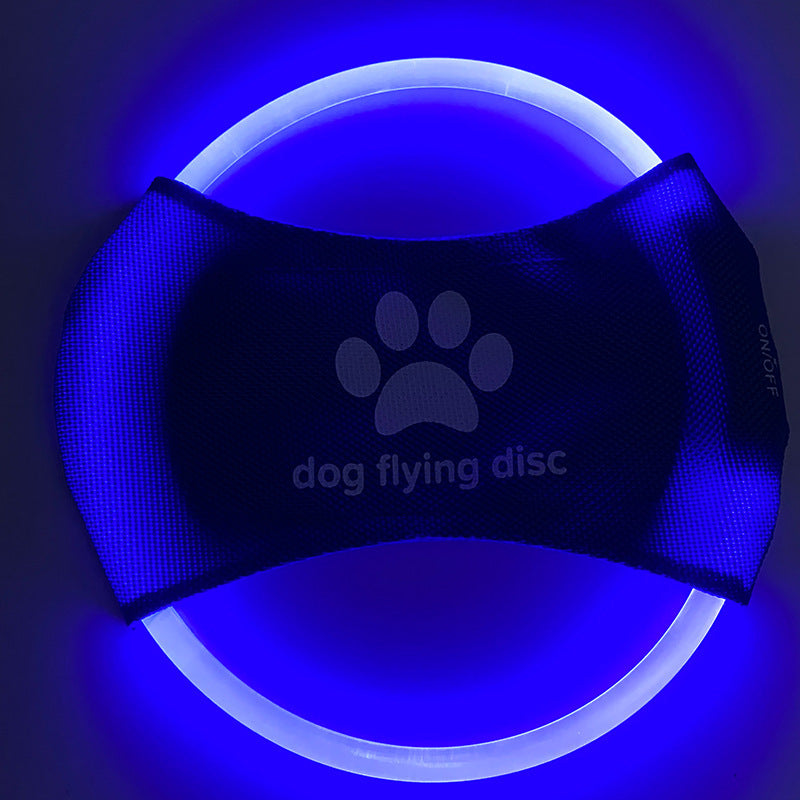 LED dog flying disc, dark blue fabric with paw icon, blue glowing ring