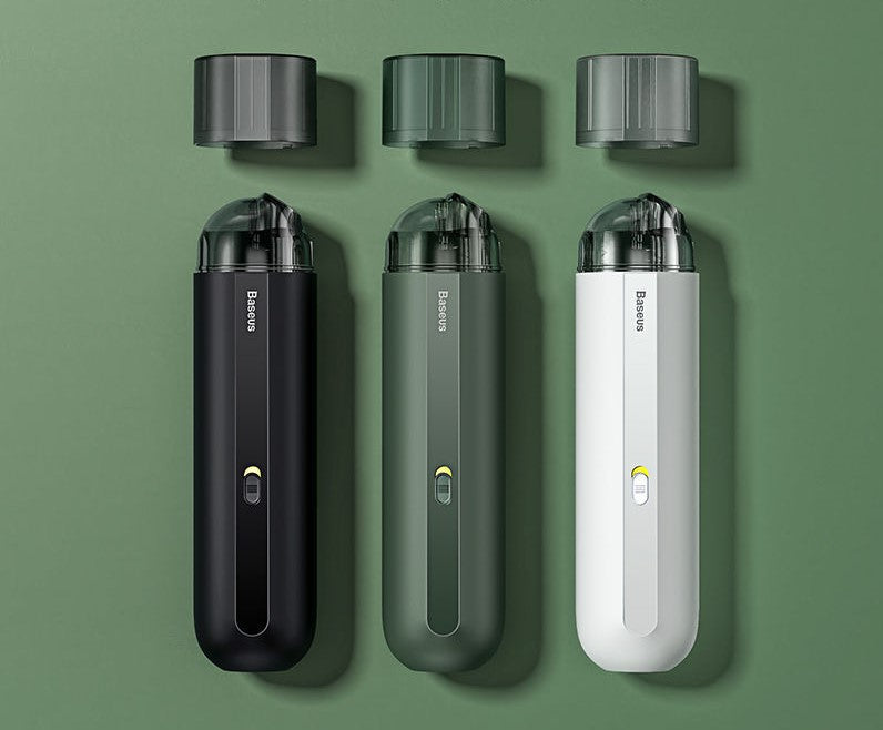 Set of handheld wireless car vacuum cleaners in black, green, and white colors