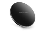 Black circular wireless charging pad with 'WIRELESS CHARGER' logo on top