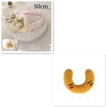 Round plush pet bed with pale inner cave and pink-trim flap, 50cm