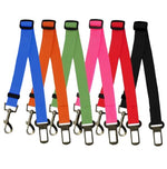 Rack of adjustable dog car seat belt straps in multiple colors with metal hooks