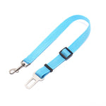 Adjustable dog car seat belt strap in light blue with metal clips and buckle adjuster.