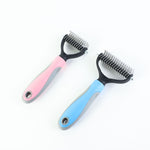Double-sided pet brushes with pink and blue handles and stainless steel grooming pins