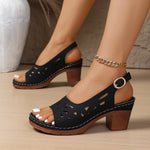 Black peep-toe platform sandals with cutout sides and round buckle mid heel