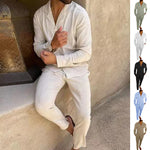 White long-sleeve lapel shirt and slim trousers set, front view with sleeves cuffed.