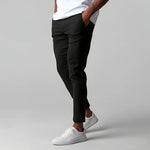 Black slim fit business suit pants with button waistband and straight tapered legs