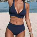 Women's solid-color bikini set with V-neck triangle top and high-rise briefs, dark navy