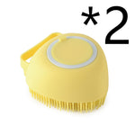Yellow silicone pet bath massage brush with round head and soft bristles