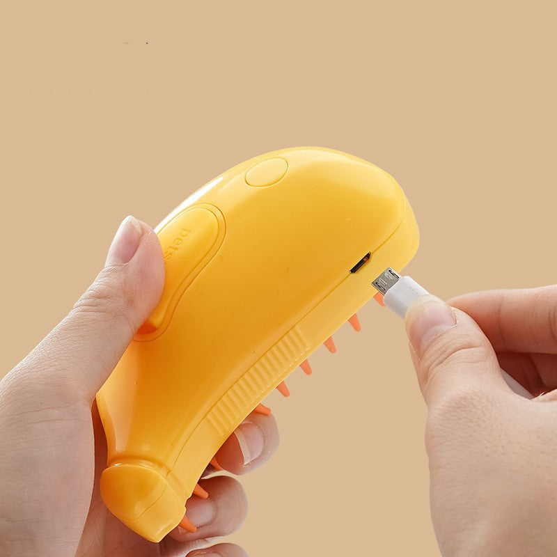 Yellow pet steam brush with sprayer nozzle attachment and side grip ridges