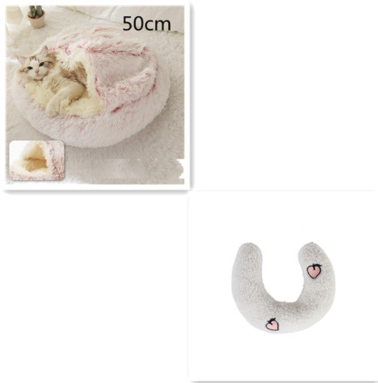 Half-moon plush bolster with light gray fabric and small face/heart patches
