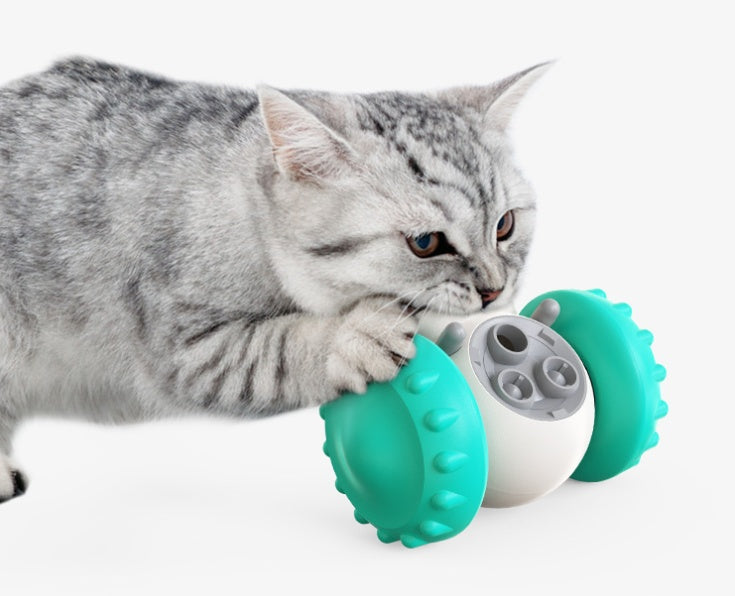 Teal-green interactive slow feed pet toy with rotating treat-dispensing wheel