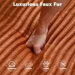 Brown corduroy upholstery fabric close-up with plush pile, hand pressing