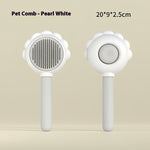 Self-cleaning pet grooming comb with spray, white round pin brush head.
