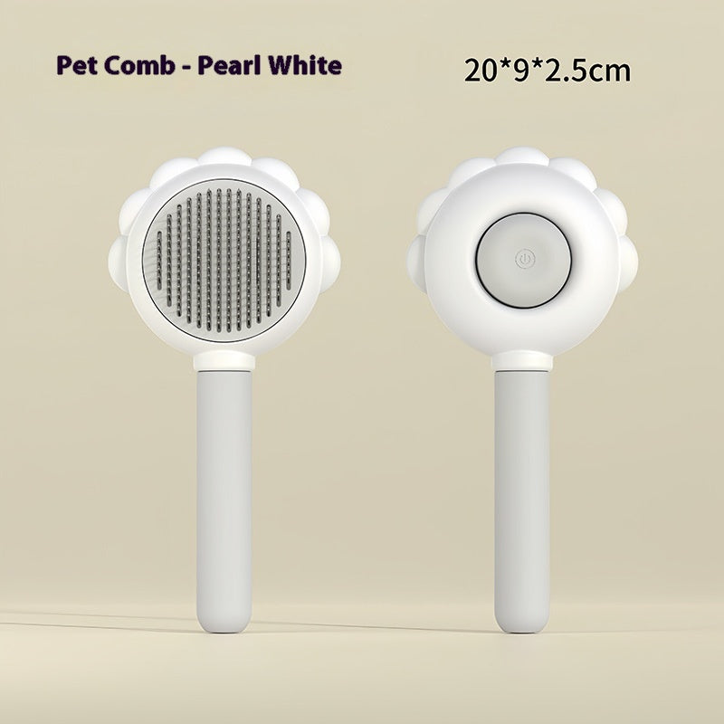 Self-cleaning pet grooming comb with spray, white round pin brush head.