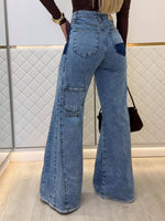 Light blue high-waisted flared jeans with stitched back pockets
