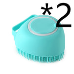 Turquoise silicone pet bath massage brush with round head and soft bristles