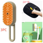 Electric steam pet brush with orange silicone grooming pad and beige handle