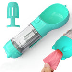 Portable pet water bottle feeder bowl: teal with clear bottle and bag dispenser