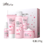 5-piece skincare set with pink Japan Sakura bottles and creams in gift box