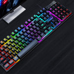 Gaming keyboard close-up with multicolor RGB keys and T-VOLF logo on panel