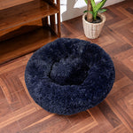 Round shaggy pet sleep bed in dark navy, with raised edge and cozy inner nest