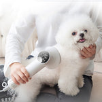 White pet grooming blow dryer with comb head, digital controls, and nozzle opening