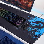 Desk mouse pad with black surface, blue dragon graphic, and non-slip base