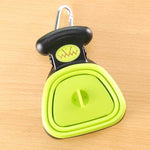 Green foldable pet waste scooper with black top handle
