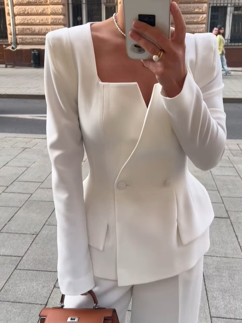 White women's two-button blazer with square collar and long sleeves