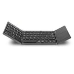 Foldable Bluetooth keyboard with dark keys and integrated trackpad panel