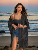 Black lace embroidered long cardigan, open front with draped loose silhouette.